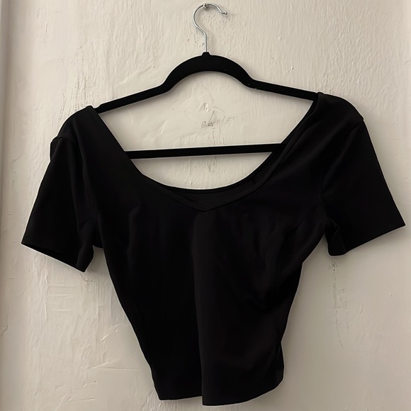 Tops Lululemon Women’s Fitted Cropped Short SleeveColor: Black Size S - Picture 2 of 2